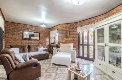 Casa em condomínio fechado com 3 quartos à venda na Rua José Grimberg, 100, Rubem Berta, Porto Alegre, 173 m2 por R$ 699.000