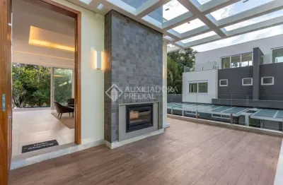 Casa em condomínio fechado com 3 quartos à venda na rua doutor ney de castilhos ferreira, 300, pedra redonda, porto alegre, 438 m2 por r$ 2.400.000