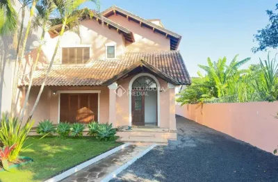 Casa com 5 quartos à venda na rua atílio supertti, 87, vila nova, porto alegre, 283 m2 por r$ 1.510.000