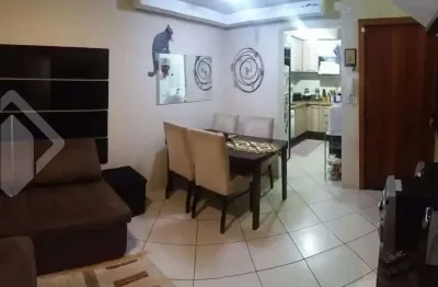 Casa em condomínio fechado com 2 quartos à venda na avenida guarujá, 126, guarujá, porto alegre, 105 m2 por r$ 360.000