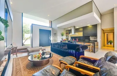 Casa em condomínio fechado com 4 quartos à venda na avenida juca batista, 8000, chapéu do sol, porto alegre, 418 m2 por r$ 3.590.000