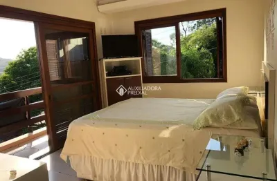 Casa em condomínio fechado com 4 quartos à venda na avenida vicente monteggia, 2000, cavalhada, porto alegre, 120 m2 por r$ 850.000
