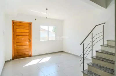 Casa em condomínio fechado com 2 quartos à venda na rua miguel ascoleze, 125, vila nova, porto alegre, 60 m2 por r$ 299.000