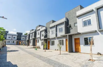 Casa em condomínio fechado com 2 quartos à venda na rua miguel ascoleze, 125, vila nova, porto alegre, 60 m2 por r$ 319.000