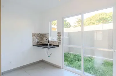 Casa em condomínio fechado com 2 quartos à venda na rua miguel ascoleze, 125, vila nova, porto alegre, 60 m2 por r$ 319.000