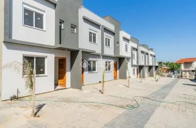 Casa em condomínio fechado com 2 quartos à venda na rua miguel ascoleze, 125, vila nova, porto alegre, 60 m2 por r$ 319.000