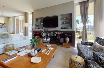 Casa em condomínio fechado com 4 quartos à venda na avenida paraguassu, 24, centro, xangri-lá, 460 m2 por r$ 3.800.000