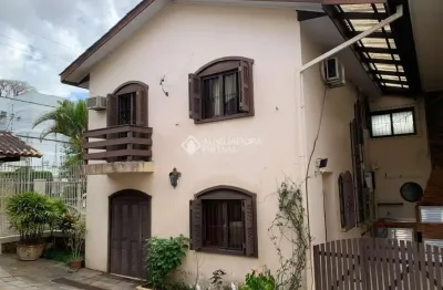 Casa em condomínio fechado com 3 quartos à venda na rua landel de moura, 1552, tristeza, porto alegre, 98 m2 por r$ 550.000