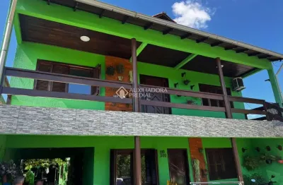 Casa em condomínio fechado com 4 quartos à venda na avenida figueira, 200, mário quintana, porto alegre, 240 m2 por r$ 700.000