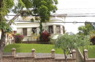 Casa em condomínio fechado com 3 quartos à venda na rua guilherme schell, 209, santo antônio, porto alegre, 377 m2 por r$ 1.720.000