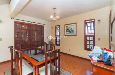 Casa com 4 quartos à venda na travessa oito de setembro, 84, santa tereza, porto alegre, 234 m2 por r$ 459.800
