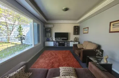 Casa em condomínio fechado com 4 quartos à venda na rua professor clemente pinto, 159, medianeira, porto alegre, 248 m2 por r$ 930.000