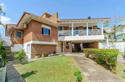 Casa em condomínio fechado com 3 quartos à venda na rua alcebíades antônio dos santos, 356, nonoai, porto alegre, 262 m2 por r$ 1.499.000