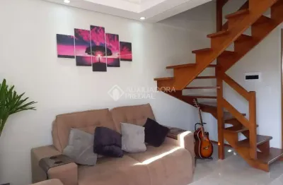 Casa em condomínio fechado com 2 quartos à venda na Rua Capitão Pedroso, 416, Restinga, Porto Alegre, 84 m2 por R$ 269.000