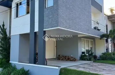 Casa em condomínio fechado com 3 quartos à venda na rua ivo walter kern, 599, hípica, porto alegre, 260 m2 por r$ 1.200.000