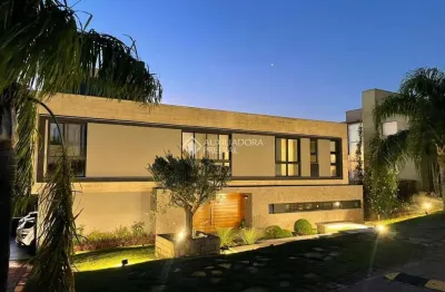 Casa em condomínio fechado com 4 quartos à venda na rua bertha loforte gonçalves, 80, vila nova, porto alegre, 443 m2 por r$ 4.890.000