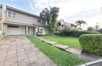 Casa em condomínio fechado com 4 quartos à venda na Avenida Juca Batista, 1200, Cavalhada, Porto Alegre, 300 m2 por R$ 1.190.000