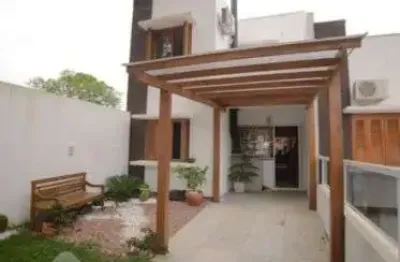 Casa em condomínio fechado com 3 quartos à venda na Rua Ernesto Porfírio dos Reis, 214, Hípica, Porto Alegre, 133 m2 por R$ 370.000