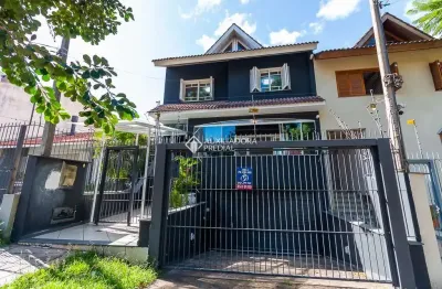 Casa em condomínio fechado com 3 quartos à venda na rua joão paetzel, 1060, chácara das pedras, porto alegre, 337 m2 por r$ 1.500.000