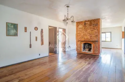 Casa com 3 quartos à venda na avenida clemenciano barnasque, 219, teresópolis, porto alegre, 400 m2 por r$ 990.000