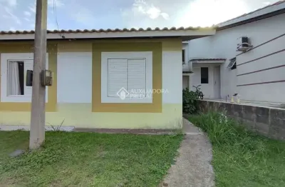 Casa em condomínio fechado com 3 quartos à venda na Acesso Terra Nova, 601, Terra Nova, Alvorada, 51 m2 por R$ 220.000