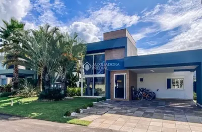Casa em condomínio fechado com 5 quartos à venda na rua rio novo, 2672, centro, xangri-lá, 330 m2 por r$ 2.490.000
