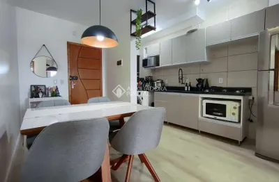 Apartamento com 2 quartos à venda na rua cento e quarenta e dois, 155, jardim algarve, alvorada, 63 m2 por r$ 240.000