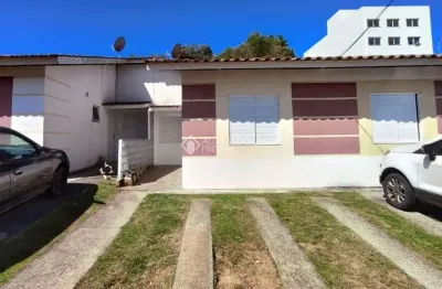 Casa em condomínio fechado com 2 quartos à venda na acesso terra nova, 601, terra nova, alvorada, 51 m2 por r$ 244.000
