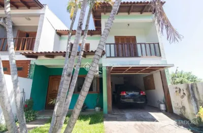 Casa em condomínio fechado com 3 quartos à venda na rua márcio dias, 176, nonoai, porto alegre, 317 m2 por r$ 850.000
