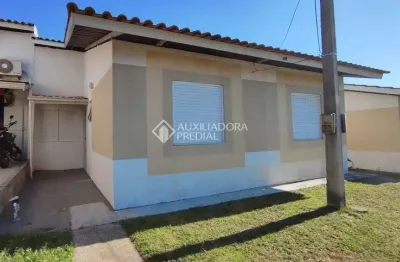 Casa em condomínio fechado com 2 quartos à venda na acesso terra nova, 601, terra nova, alvorada, 51 m2 por r$ 215.000
