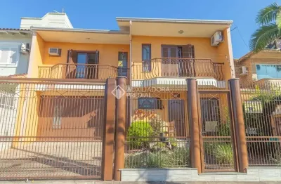 Casa com 3 quartos à venda na Rua Andrômeda, 127, Estância Velha, Canoas, 182 m2 por R$ 1.050.000