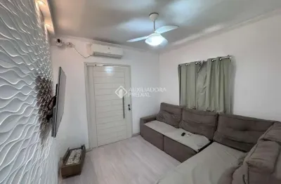 Casa com 2 quartos à venda na Rua Henrique Cavalheiro dos Santos, 40, Maringá, Alvorada, 69 m2 por R$ 259.000