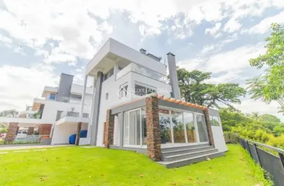 Casa em condomínio fechado com 3 quartos para alugar na avenida coronel marcos, 1239, pedra redonda, porto alegre, 335 m2 por r$ 29.900
