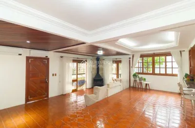 Casa em condomínio fechado com 3 quartos para alugar na rua alcebíades antônio dos santos, 356, nonoai, porto alegre, 340 m2 por r$ 6.500