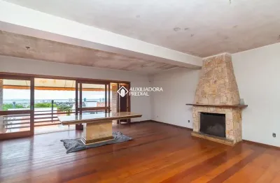 Casa em condomínio fechado com 4 quartos para alugar na rua alcebíades antônio dos santos, 169, nonoai, porto alegre, 350 m2 por r$ 7.800