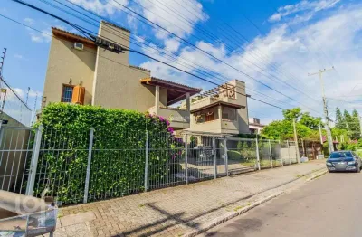 Casa em condomínio fechado com 2 quartos para alugar na avenida guarujá, 126, guarujá, porto alegre, 103 m2 por r$ 2.200