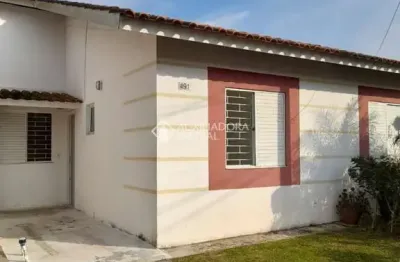 Casa em condomínio fechado com 3 quartos para alugar na acesso terra nova, 601, terra nova, alvorada, 86 m2 por r$ 1.600