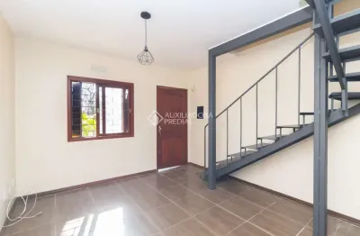 Casa em condomínio fechado com 2 quartos para alugar na estrada campo novo, 361, ipanema, porto alegre, 56 m2 por r$ 1.700