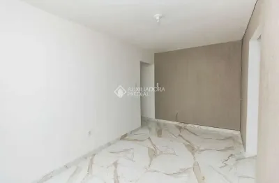Apartamento com 2 quartos para alugar na rua professor joão de souza ribeiro, 995, humaitá, porto alegre, 58 m2 por r$ 1.200