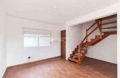 Casa em condomínio fechado com 2 quartos para alugar na rua santa mônica, 404, ponta grossa, porto alegre, 70 m2 por r$ 1.500