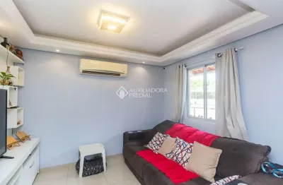 Casa em condomínio fechado com 3 quartos para alugar na Avenida João Ferreira Jardim, 140, Parque Santa Fé, Porto Alegre, 116 m2 por R$ 3.000