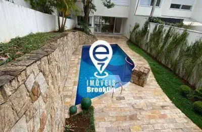 Casa de condomínio de 425 m² com 4 suítes e 7 banheiros 4 vagas à venda,