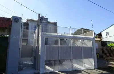 Casa com 5 quartos à venda no Santa Tereza, Porto Alegre 