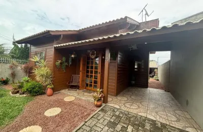 Casa com 3 quartos à venda na Rua Benjamin Gusmão, 25, Bom Sucesso, Gravataí por R$ 424.900