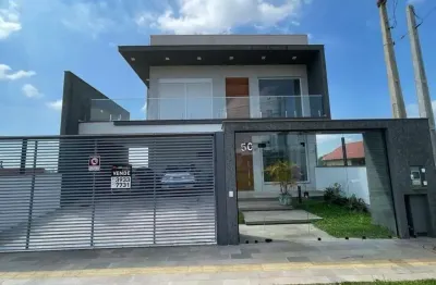 Casa com 3 quartos à venda na Rua Ary Inhoque, 50, Dom Feliciano, Gravataí, 250 m2 por R$ 1.300.000
