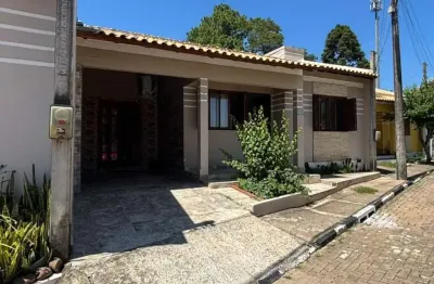 Casa em condomínio fechado com 3 quartos à venda na Rua Vigário Luiz Azevedo, 140, Parque do Itatiaia, Gravataí, 90 m2 por R$ 350.000