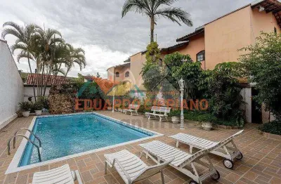 Casa com 3 dormitórios à venda, 179 m² a poucos metros da praia em Caraguatatuba/SP