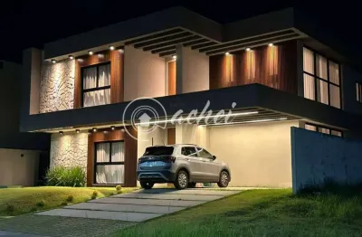 Casa de Alto Padrão no Alphaville Litoral Norte 3 | 4 Suítes, Área Gourmet Completa e Piscina com Hidromassagem