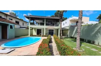 Casa de condomínio à venda 311/426 m², 5/4, wc 6, edícula, piscina, lauro de freitas /ba.