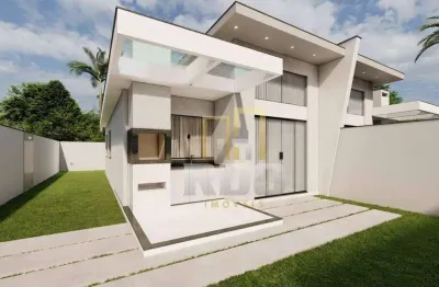 Excelente casa linear independente com pé direito alto a 700 metros da praia do enseada!